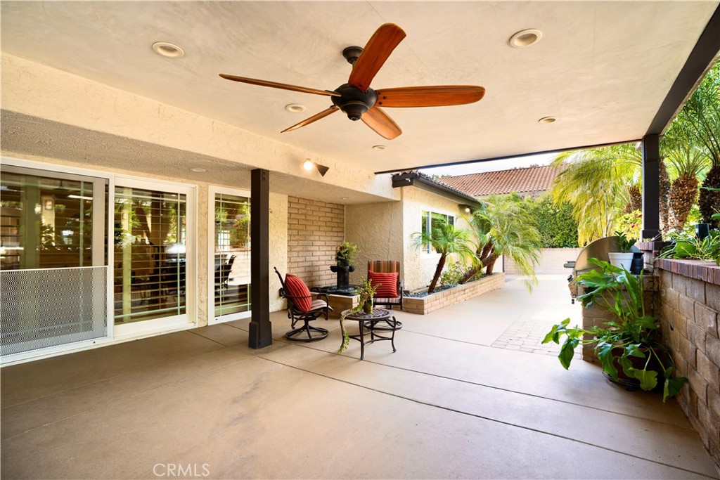 19151 Fowler Avenue Santa Ana, CA 92705 - Photo 40 of 57 The back patio off the living room.
