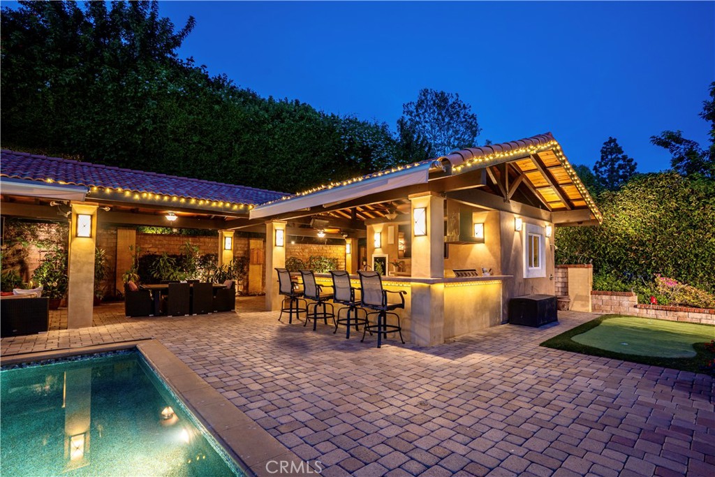 19151 Fowler Avenue Santa Ana, CA 92705 - Photo 6 of 57 The backyard Oasis at Dusk.