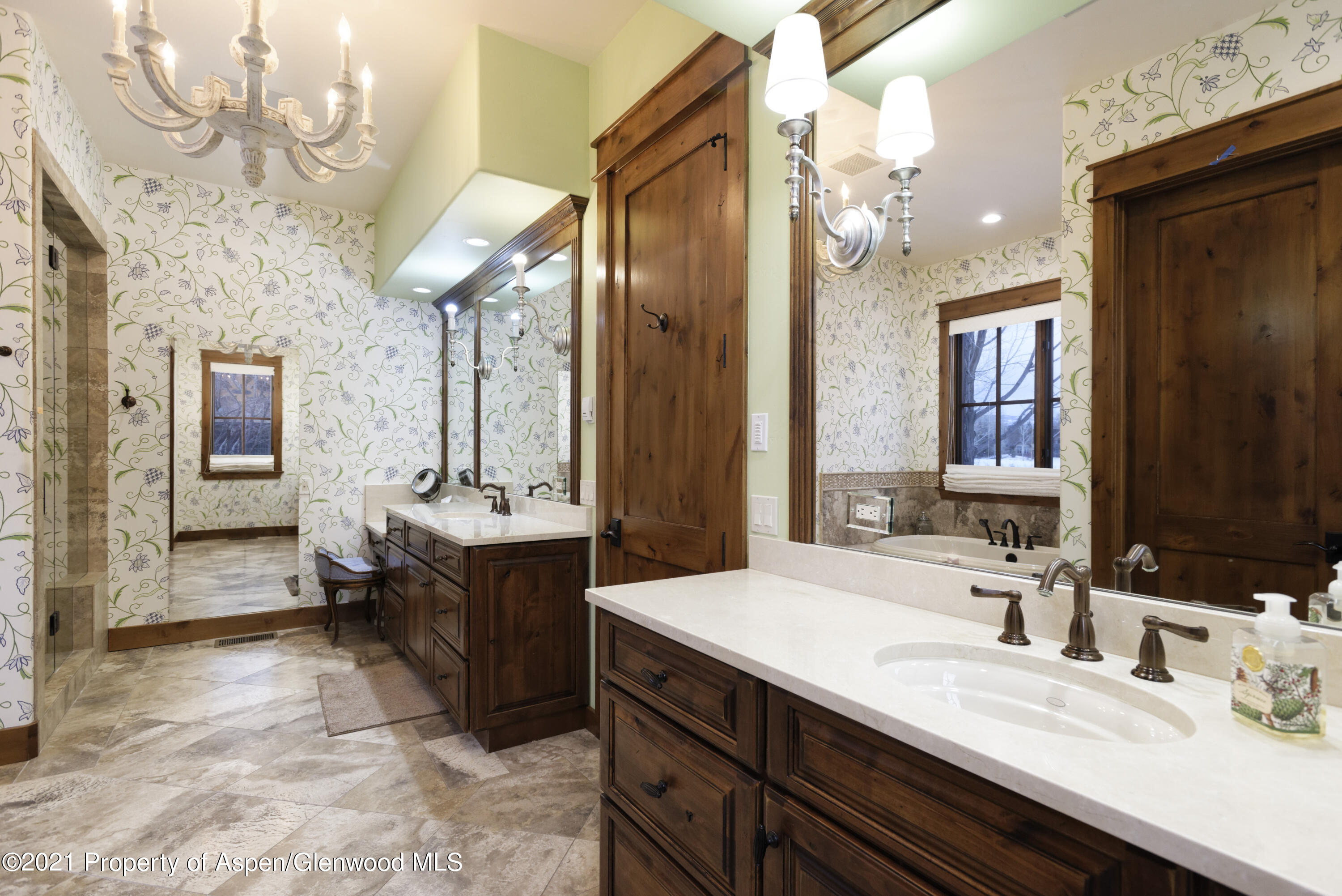 132 Diamond A Ranch Road Carbondale, CO 81623 - Photo 20 of 50 a spacious bathroom with a granite countertop sink a mirror and a shower