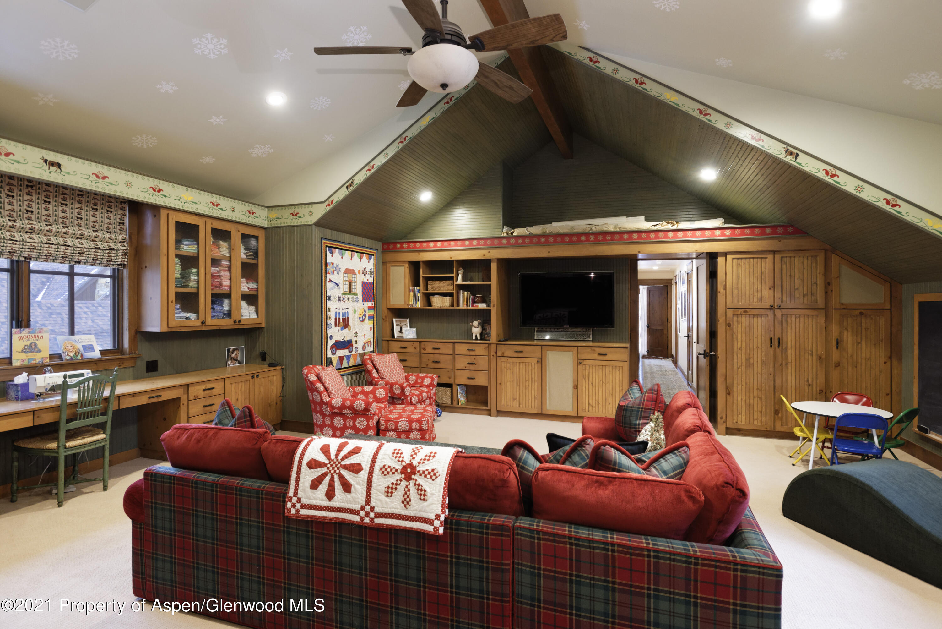 132 Diamond A Ranch Road Carbondale, CO 81623 - Photo 42 of 50 a living room with furniture and a flat screen tv