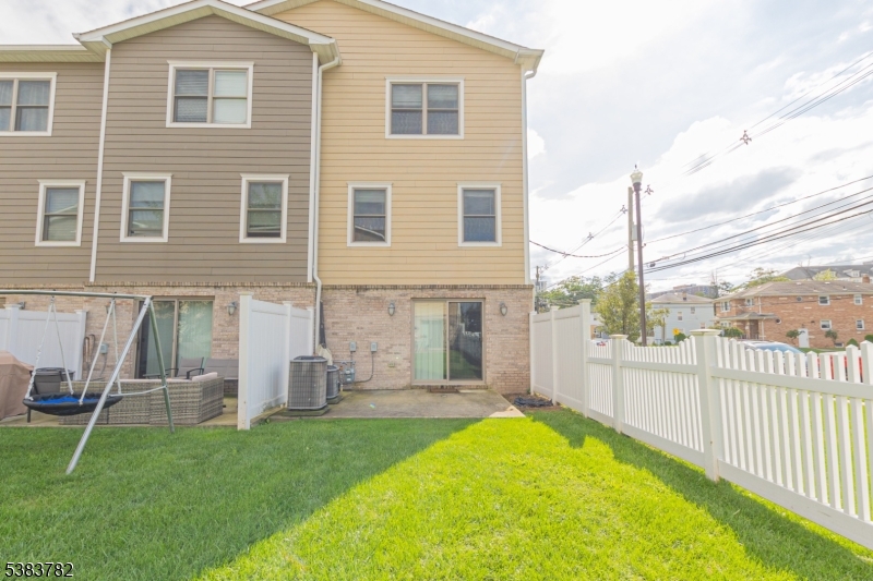 246 James Street Hackensack, NJ 07601 - Photo 23 of 23 a view of a house with a backyard