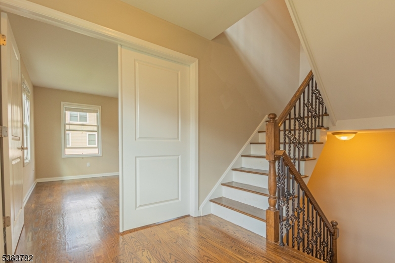 246 James Street Hackensack, NJ 07601 - Photo 9 of 23 a view of entryway with wooden floor