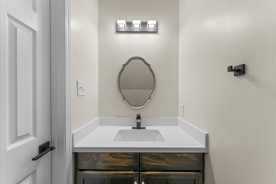 6330 Borg Breakpoint Drive Spring, TX 77379 - Photo 18 of 49 a sink and a mirror