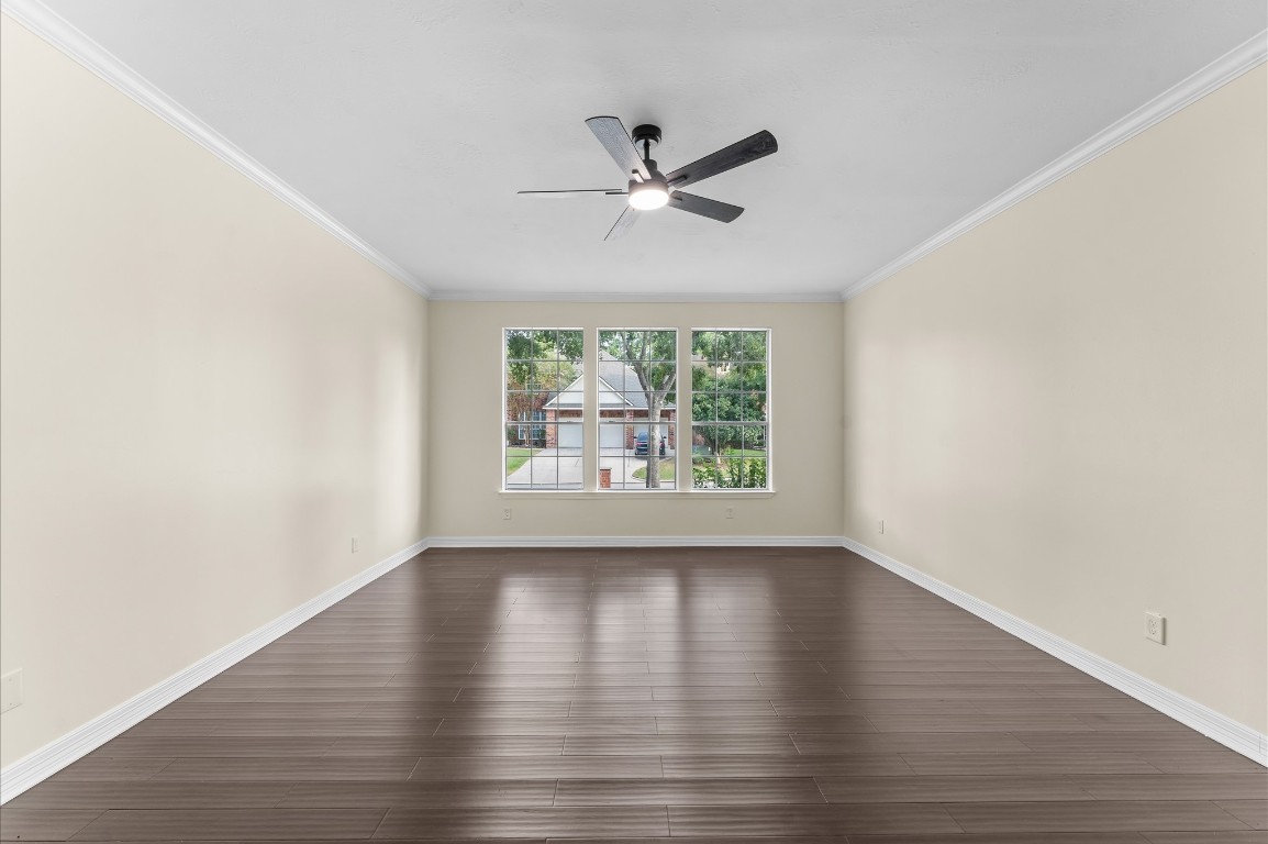 6330 Borg Breakpoint Drive Spring, TX 77379 - Photo 19 of 49 wooden floor in an empty room with a window