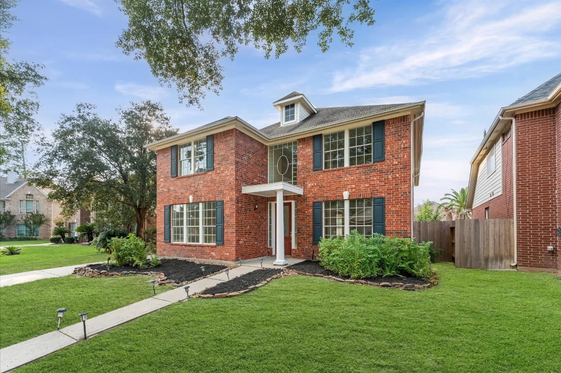 6330 Borg Breakpoint Drive Spring, TX 77379 - Photo 2 of 49 front view of a house with a yard