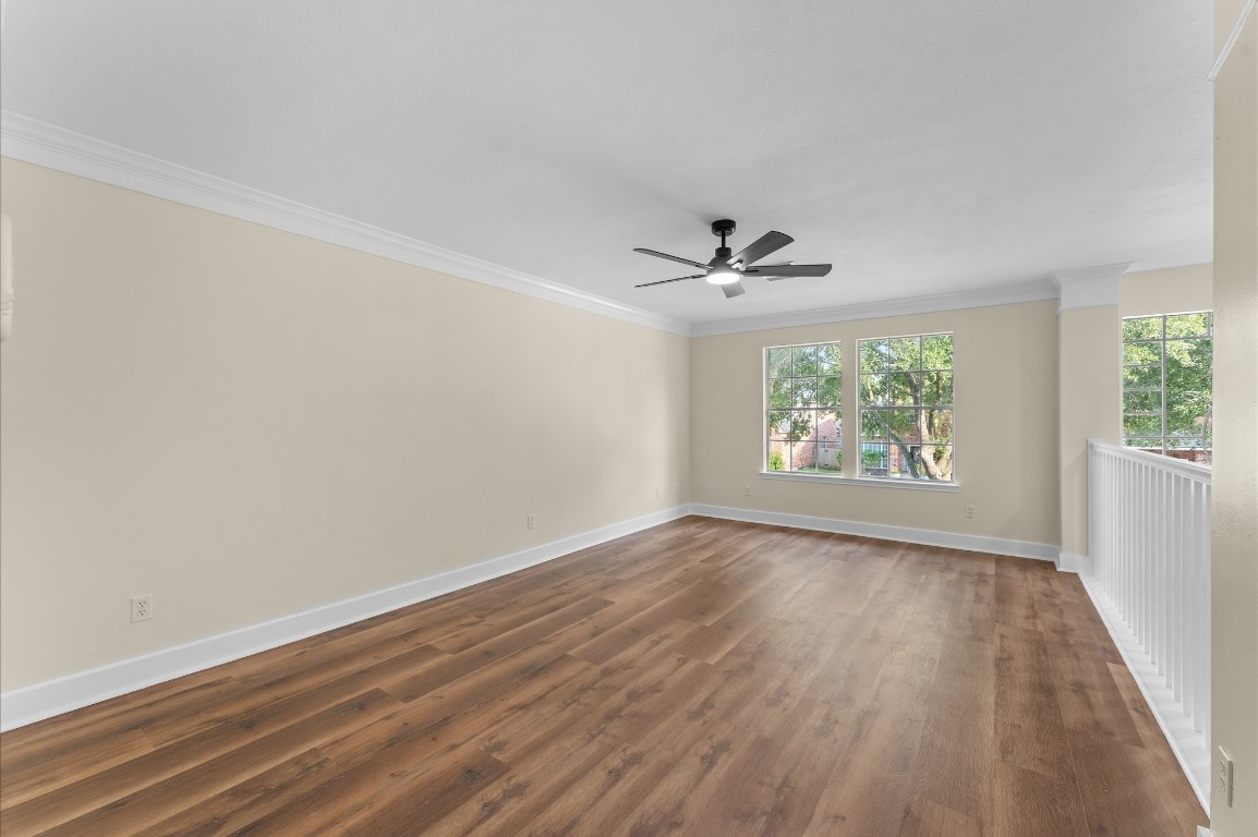 6330 Borg Breakpoint Drive Spring, TX 77379 - Photo 25 of 49 wooden floor in an empty room with a window