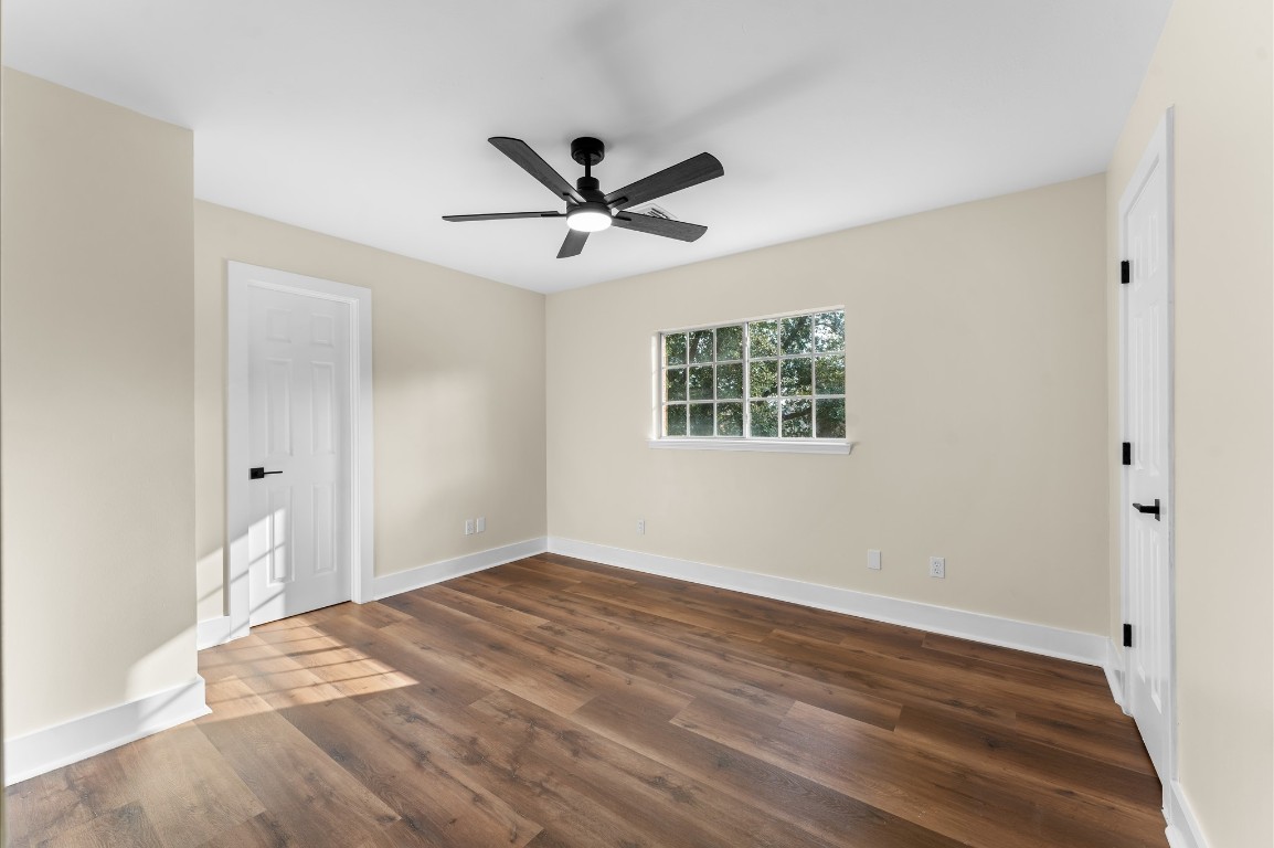 6330 Borg Breakpoint Drive Spring, TX 77379 - Photo 35 of 49 a view of empty room with wooden floor and fan