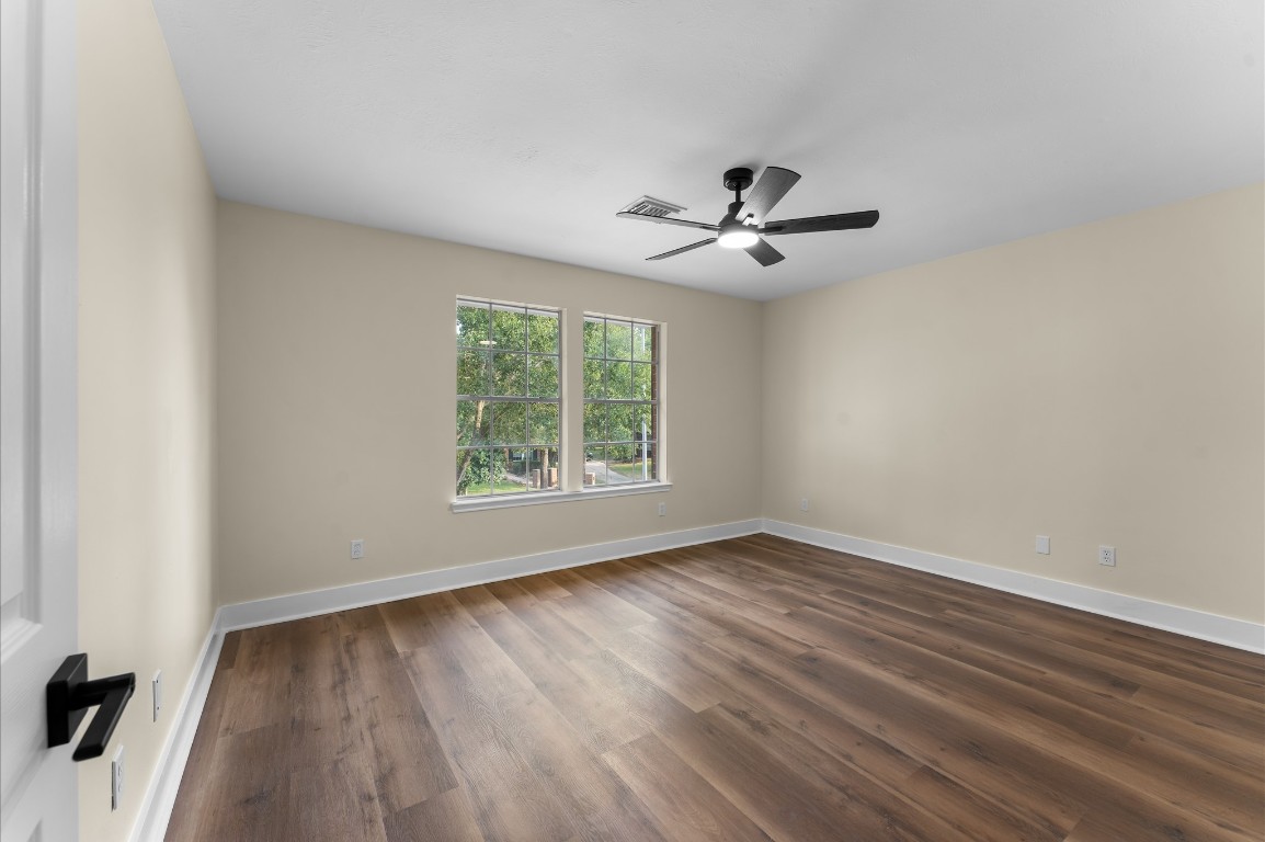 6330 Borg Breakpoint Drive Spring, TX 77379 - Photo 36 of 49 wooden floor in an empty room with a window
