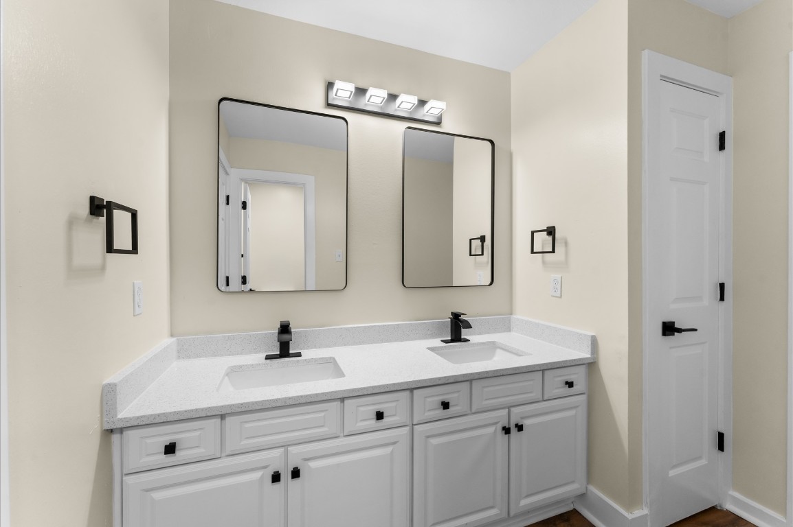 6330 Borg Breakpoint Drive Spring, TX 77379 - Photo 38 of 49 a bathroom with a double vanity sink mirror and