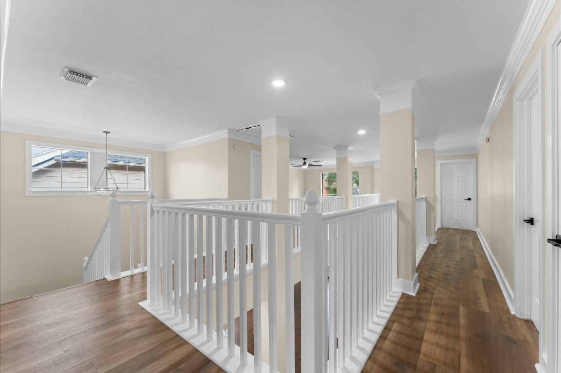 6330 Borg Breakpoint Drive Spring, TX 77379 - Photo 40 of 49 a view of a hallway with wooden floor and entryway