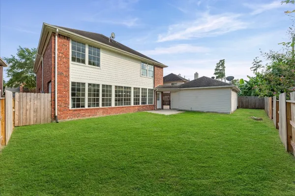 a view of a backyard with a garden