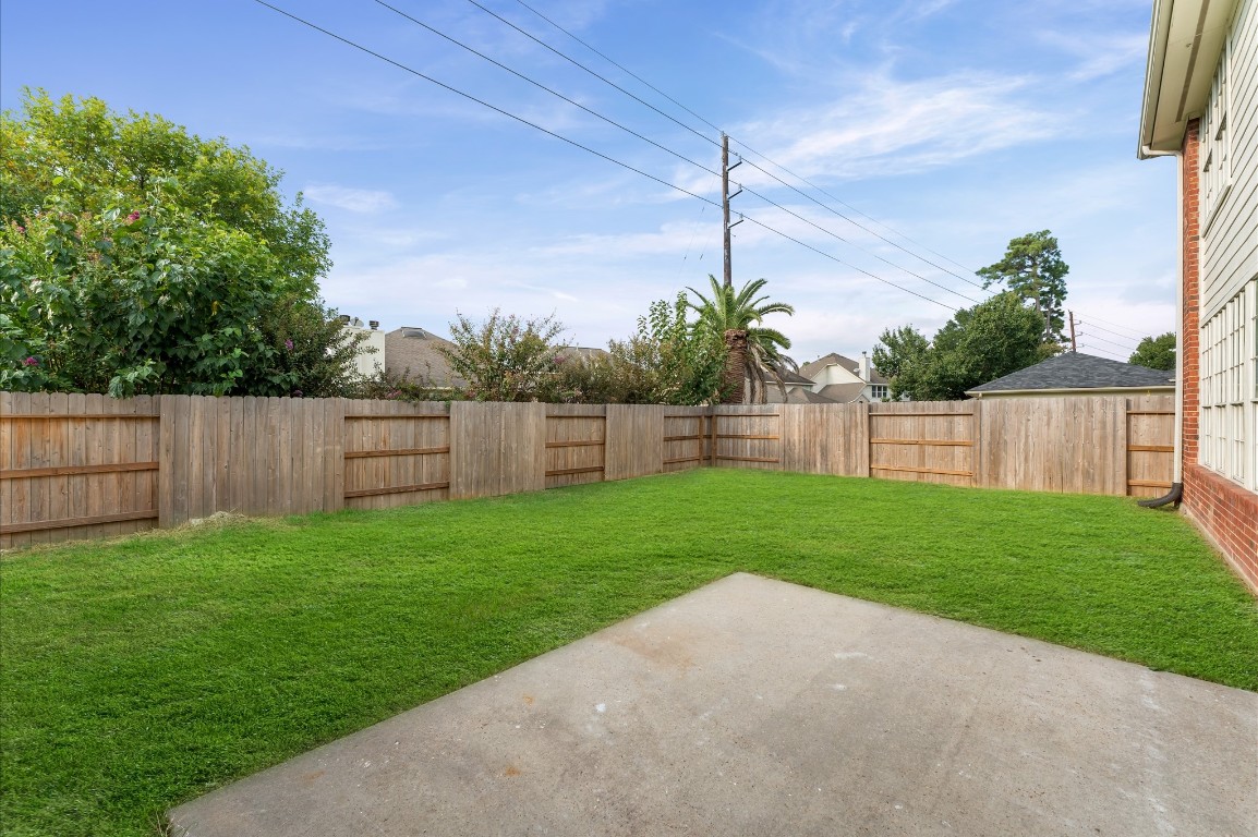 6330 Borg Breakpoint Drive Spring, TX 77379 - Photo 42 of 49 a view of a backyard with a garden