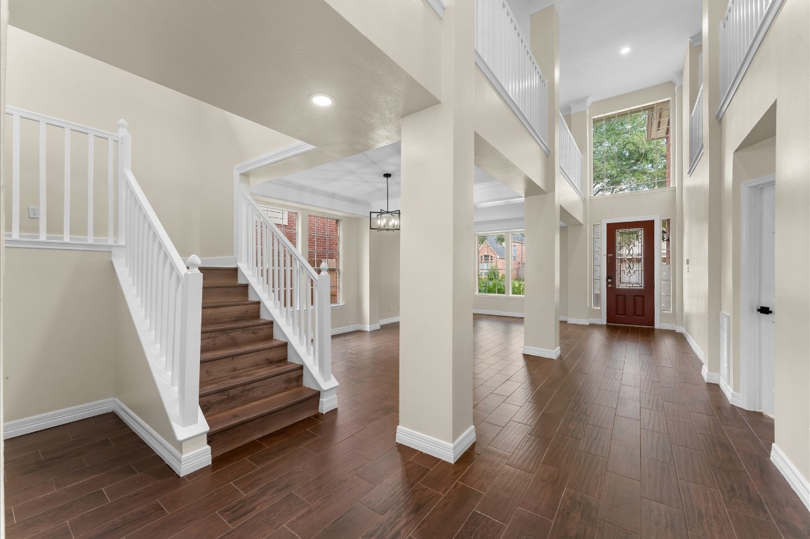 6330 Borg Breakpoint Drive Spring, TX 77379 - Photo 9 of 49 a view of an entryway with wooden floor and door
