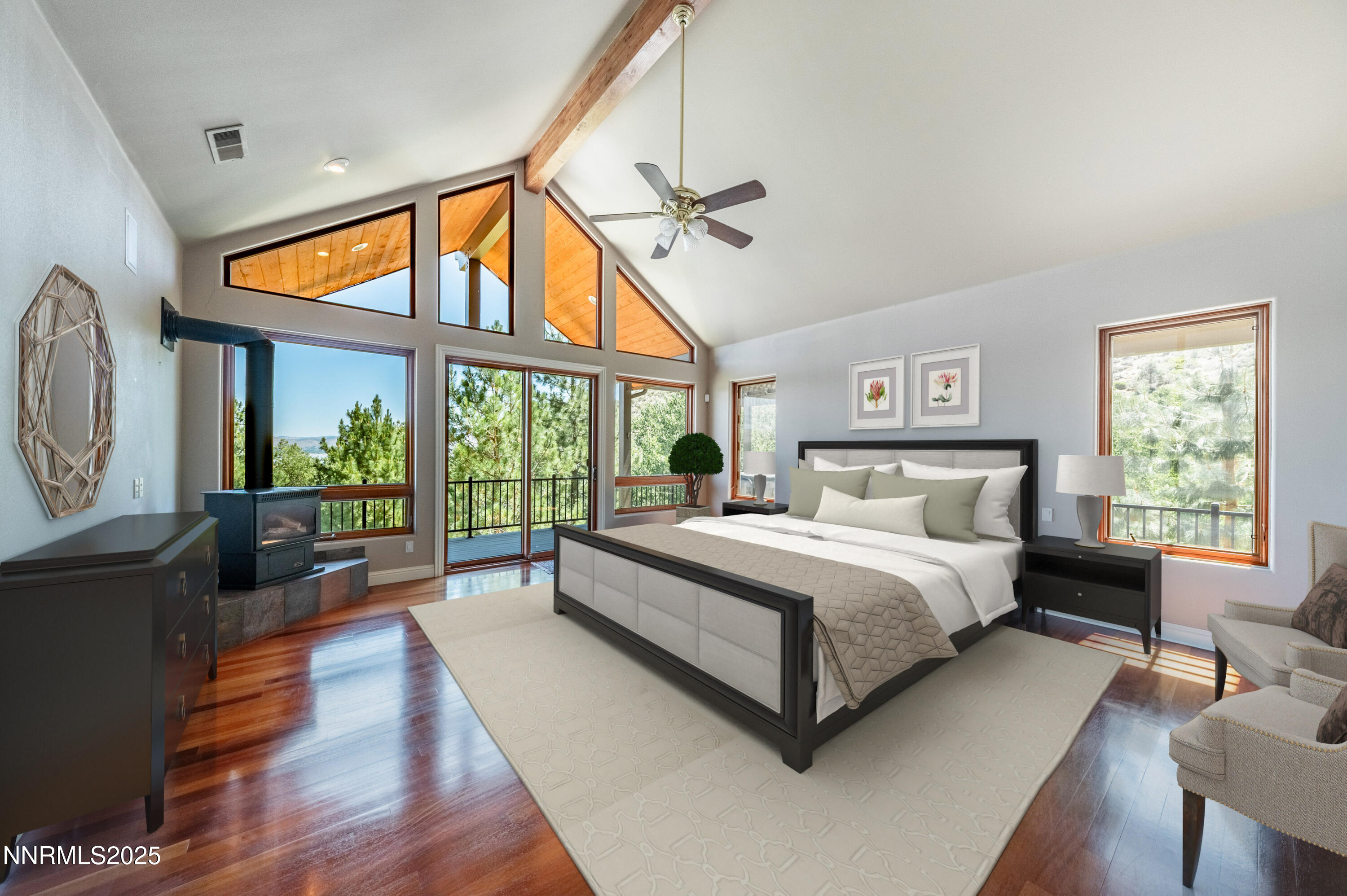 7450 Bryan Canyon Road Washoe Valley, NV 89704 - Photo 12 of 34 a spacious bedroom with a bed and a large window