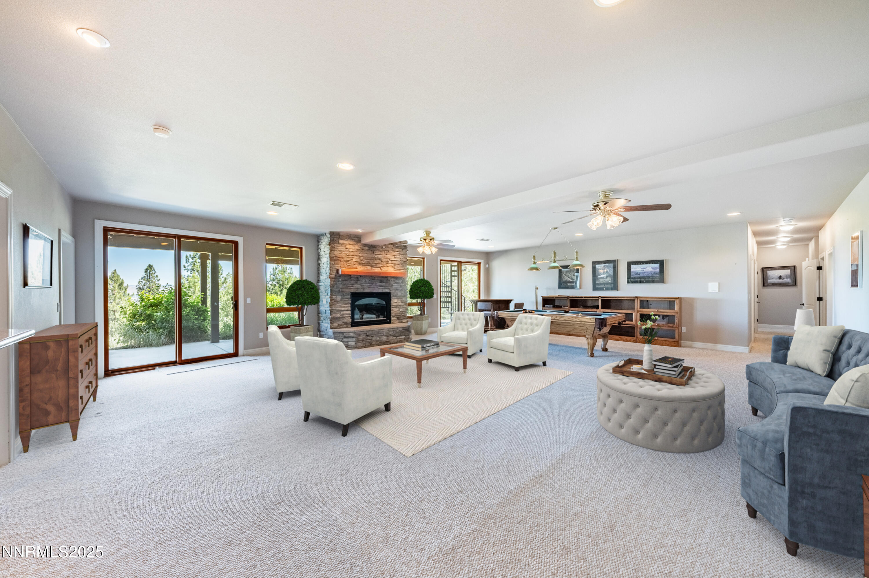 7450 Bryan Canyon Road Washoe Valley, NV 89704 - Photo 16 of 34 a living room with furniture and a large window