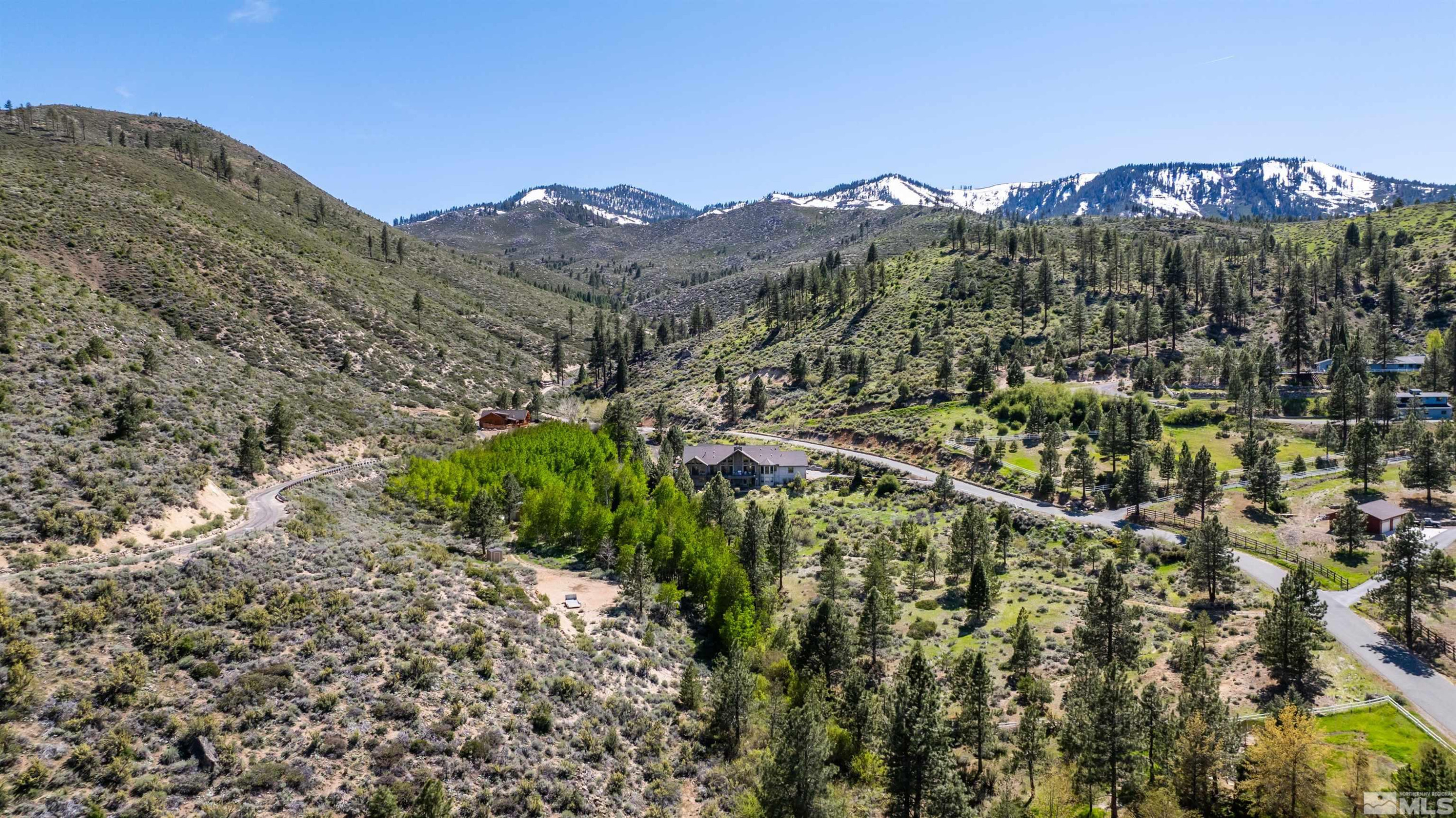 7450 Bryan Canyon Road Washoe Valley, NV 89704 - Photo 27 of 34 a view of a city with a mountain