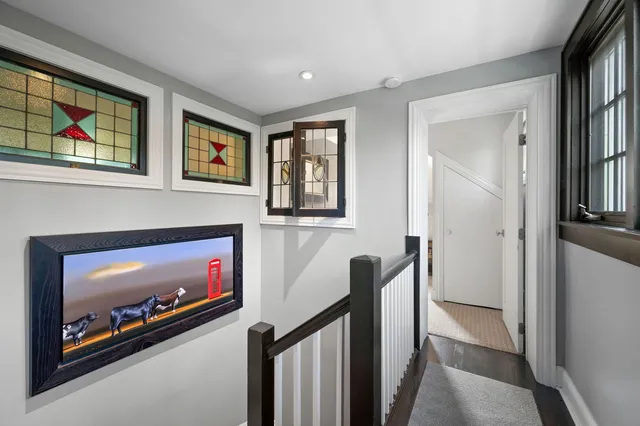 a view of an entryway with wooden floor