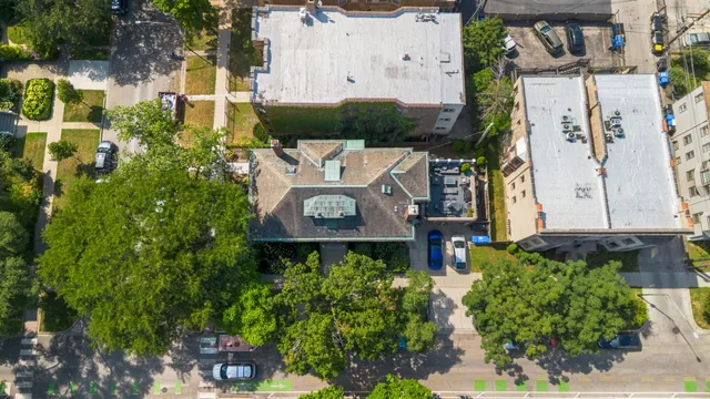 a view of a house with a yard and plants