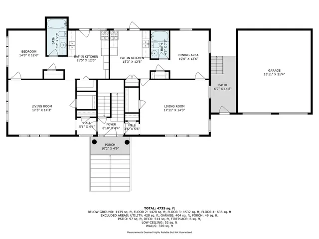 a black and white photo of a bench