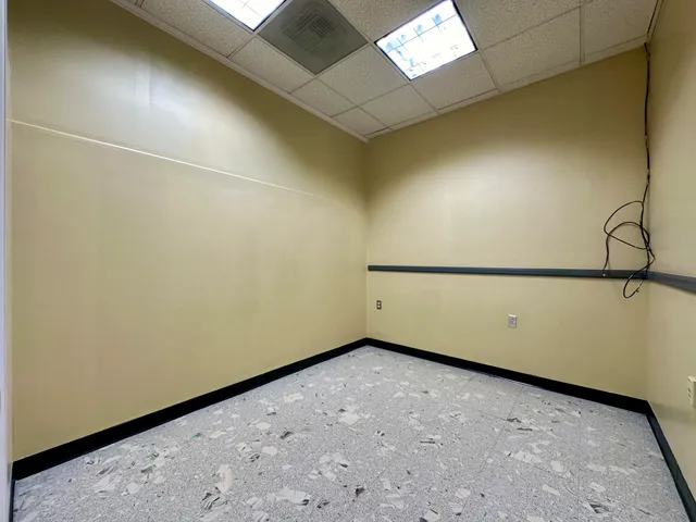 a utility room with cabinets