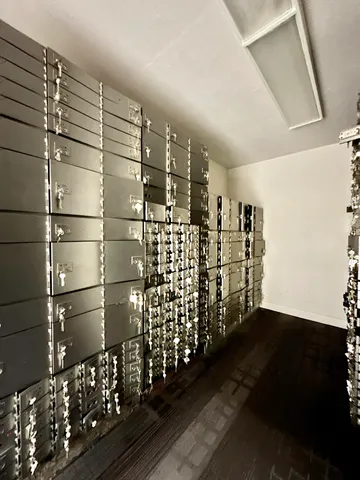 a view of an empty room with a staircase