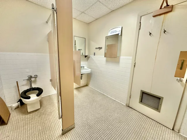 a view of a hallway with a couch