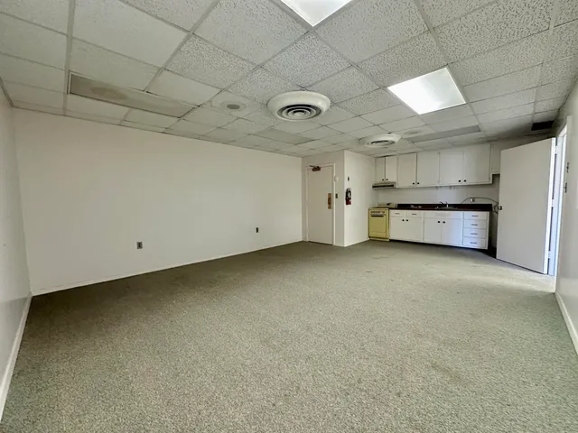 a view of a building with a terrace