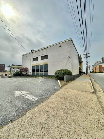 a view of furniture and table in a patio