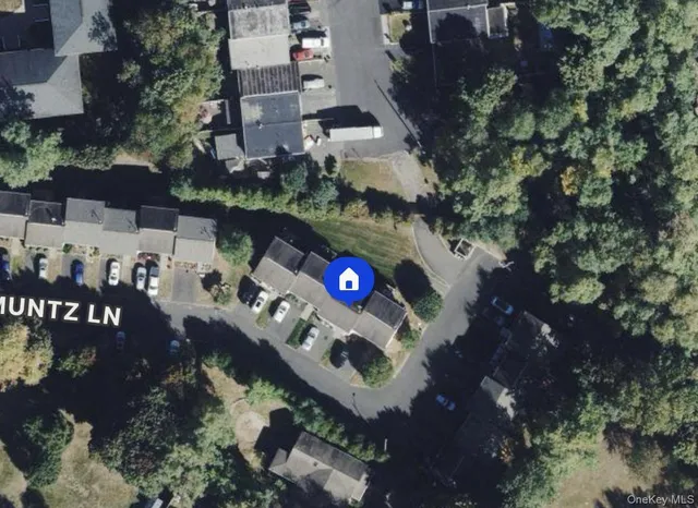 an aerial view of residential house with outdoor space