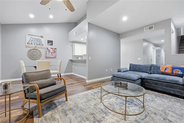 a living room with furniture and a table