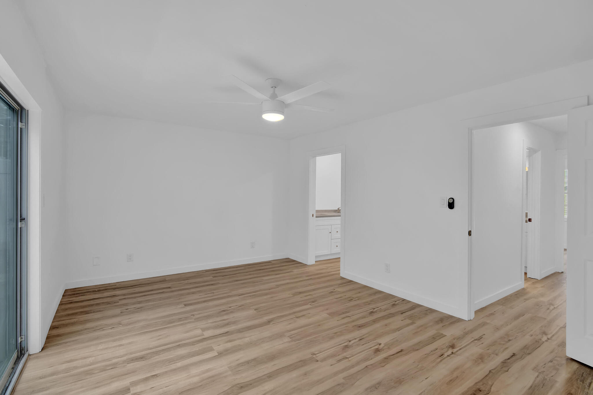 43 Summer Haven Trail, Unit 2 Miramar Beach, FL 32550 - Photo 13 of 22 a view of an empty room with wooden floor