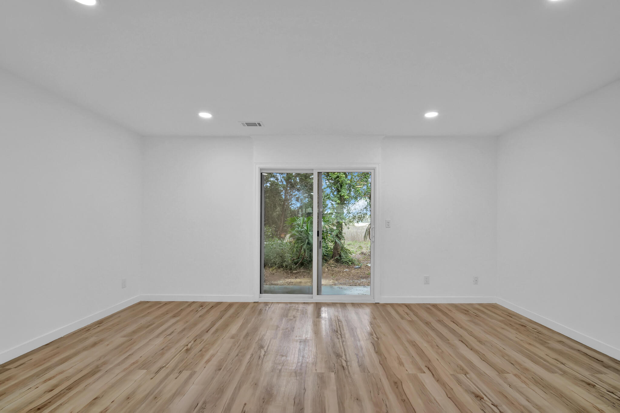 43 Summer Haven Trail, Unit 2 Miramar Beach, FL 32550 - Photo 4 of 22 wooden floor in an empty room with a window
