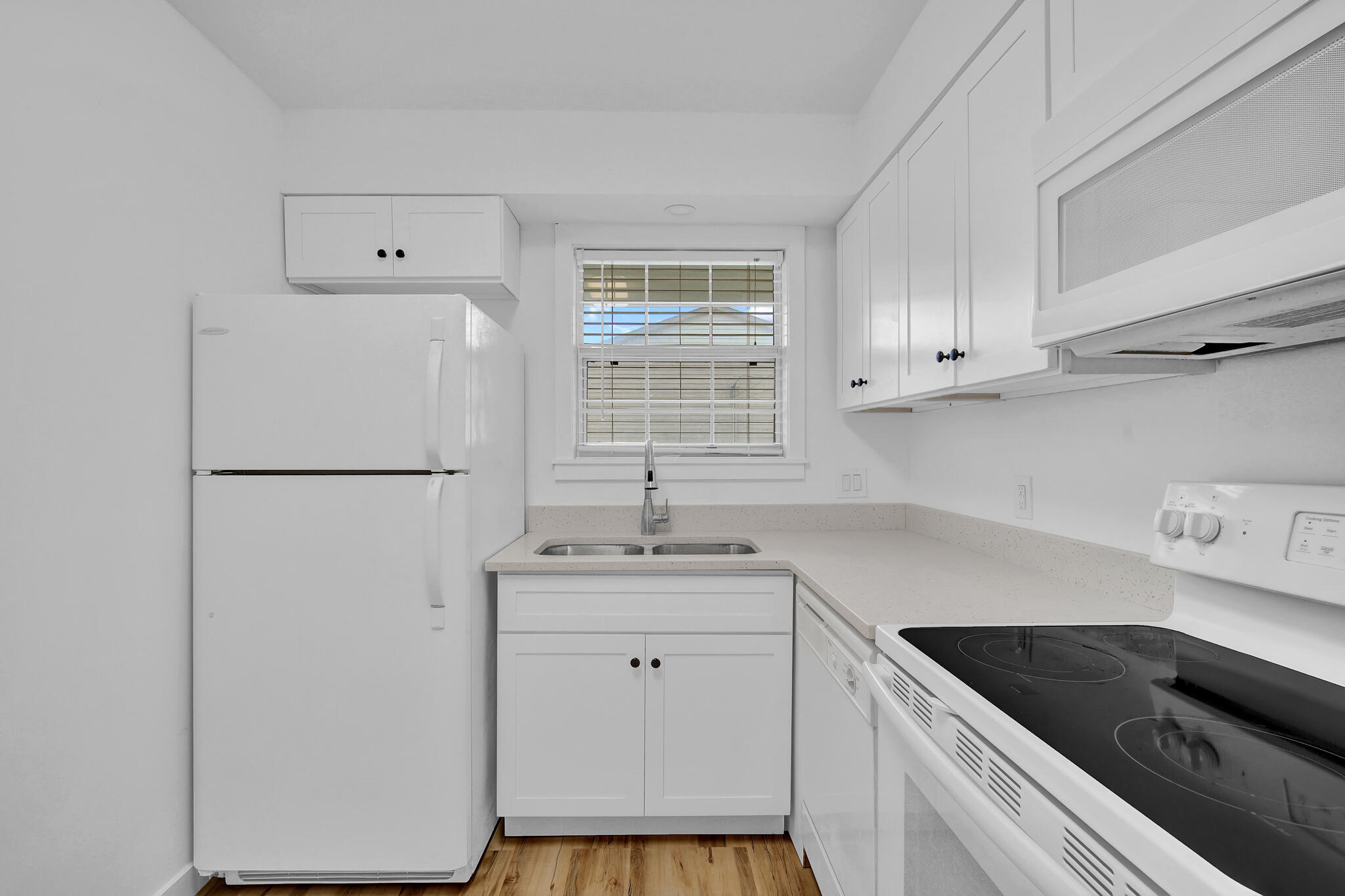 43 Summer Haven Trail, Unit 2 Miramar Beach, FL 32550 - Photo 8 of 22 a kitchen with a sink cabinets and window