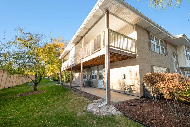 a view of a building with a yard