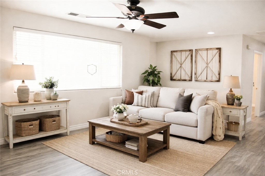 15354 Kiamichi Road Apple Valley, CA 92307 - Photo 1 of 22 a living room with furniture and a fireplace
