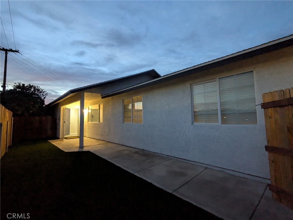15354 Kiamichi Road Apple Valley, CA 92307 - Photo 21 of 22 a view of empty room with windows