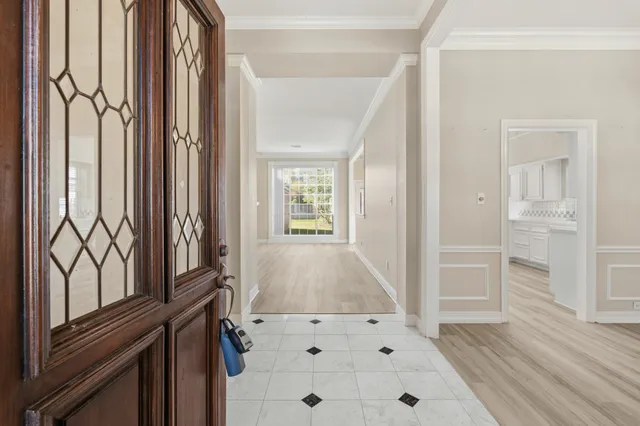 view of a living room with a window and wooden floor