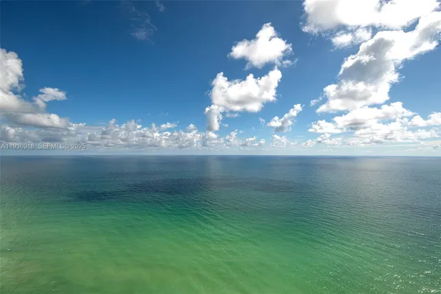 a view of a city with tall buildings