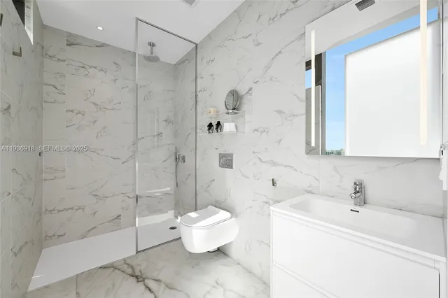 a bathroom with a sink and a shower