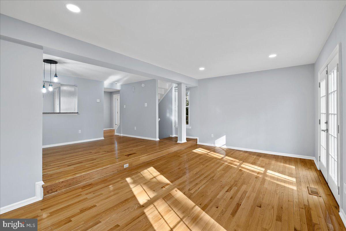 1481 Autumn Ridge Circle Reston, VA 20194 - Photo 12 of 26 a view of empty room with wooden floor