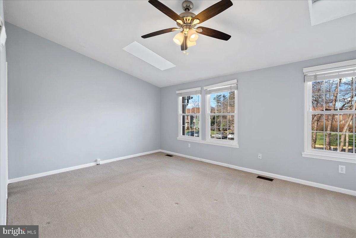 1481 Autumn Ridge Circle Reston, VA 20194 - Photo 20 of 26 a view of an empty room with a window