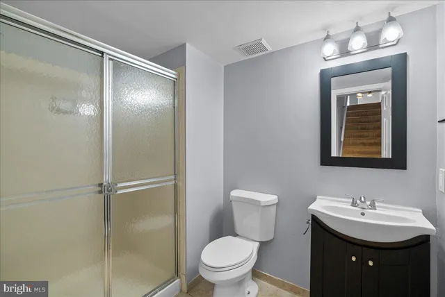 a view of storage and utility room with washer and dryer