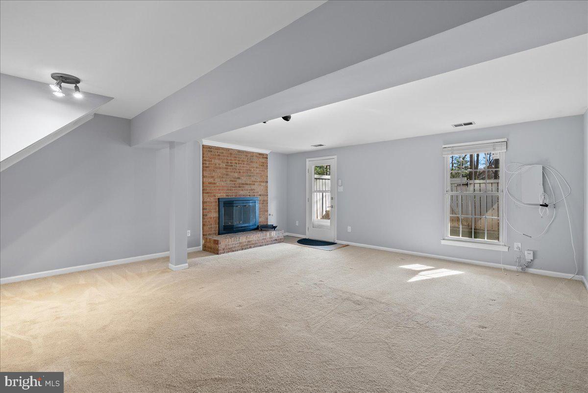 1481 Autumn Ridge Circle Reston, VA 20194 - Photo 24 of 26 an empty room with windows