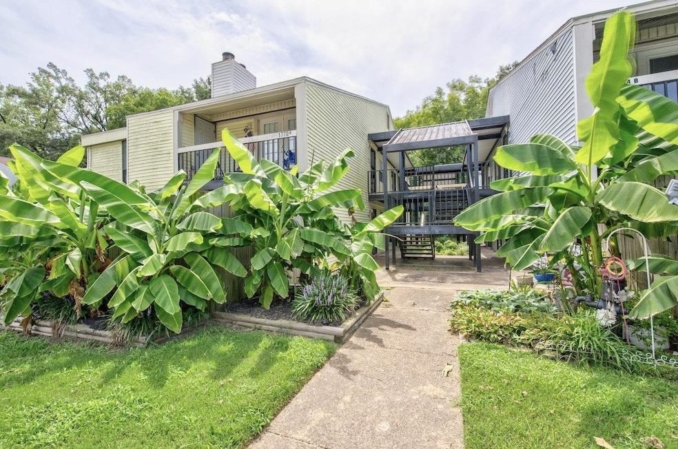 1770 Crompton 6th Square, Unit 29 Memphis, TN 38134 - Photo 1 of 21 This photo was taken last summer showcasing the lush blooming banana plants at their peak. You can expect the same beautiful fullness to return in just a few months, bringing a vibrant, tropical feel back to the outdoor space.