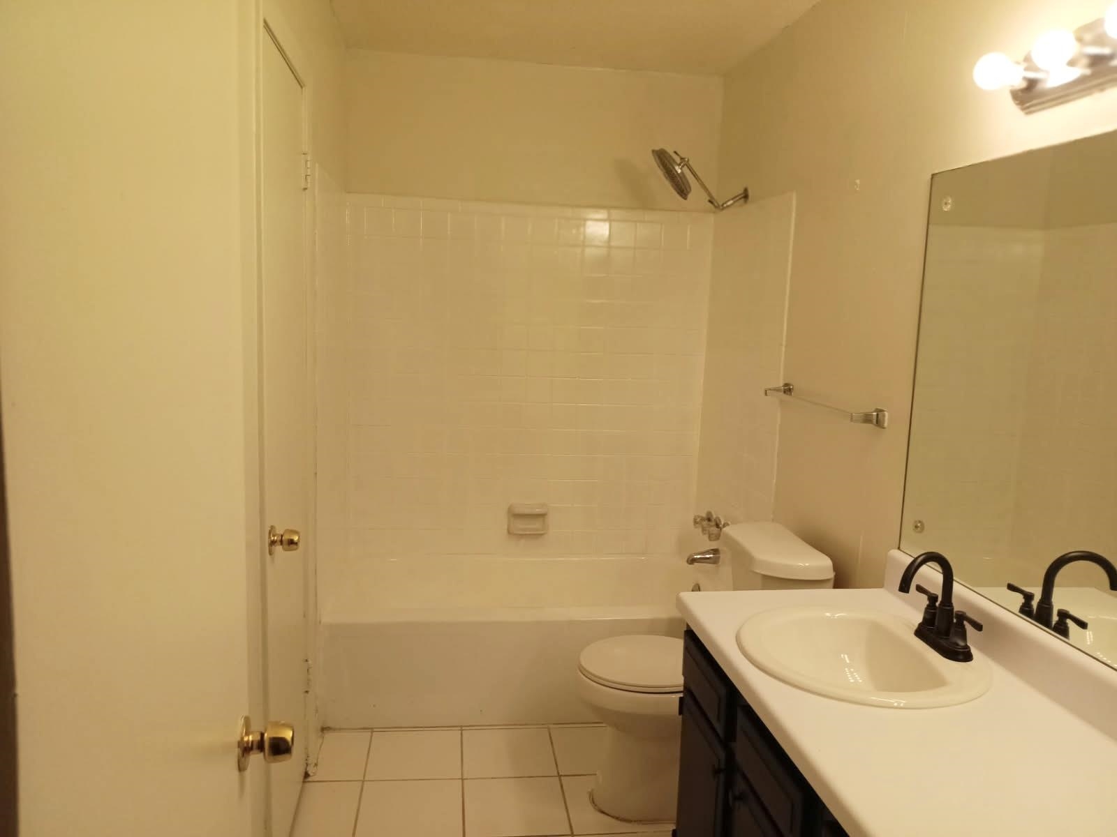 1770 Crompton 6th Square, Unit 29 Memphis, TN 38134 - Photo 11 of 21 Full bath with vanity, tile patterned flooring, and shower combination