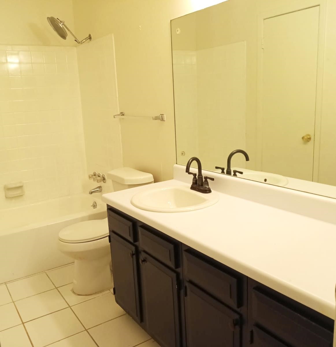 1770 Crompton 6th Square, Unit 29 Memphis, TN 38134 - Photo 12 of 21 Full bath with vanity, bathtub / shower combination, and light tile patterned floors