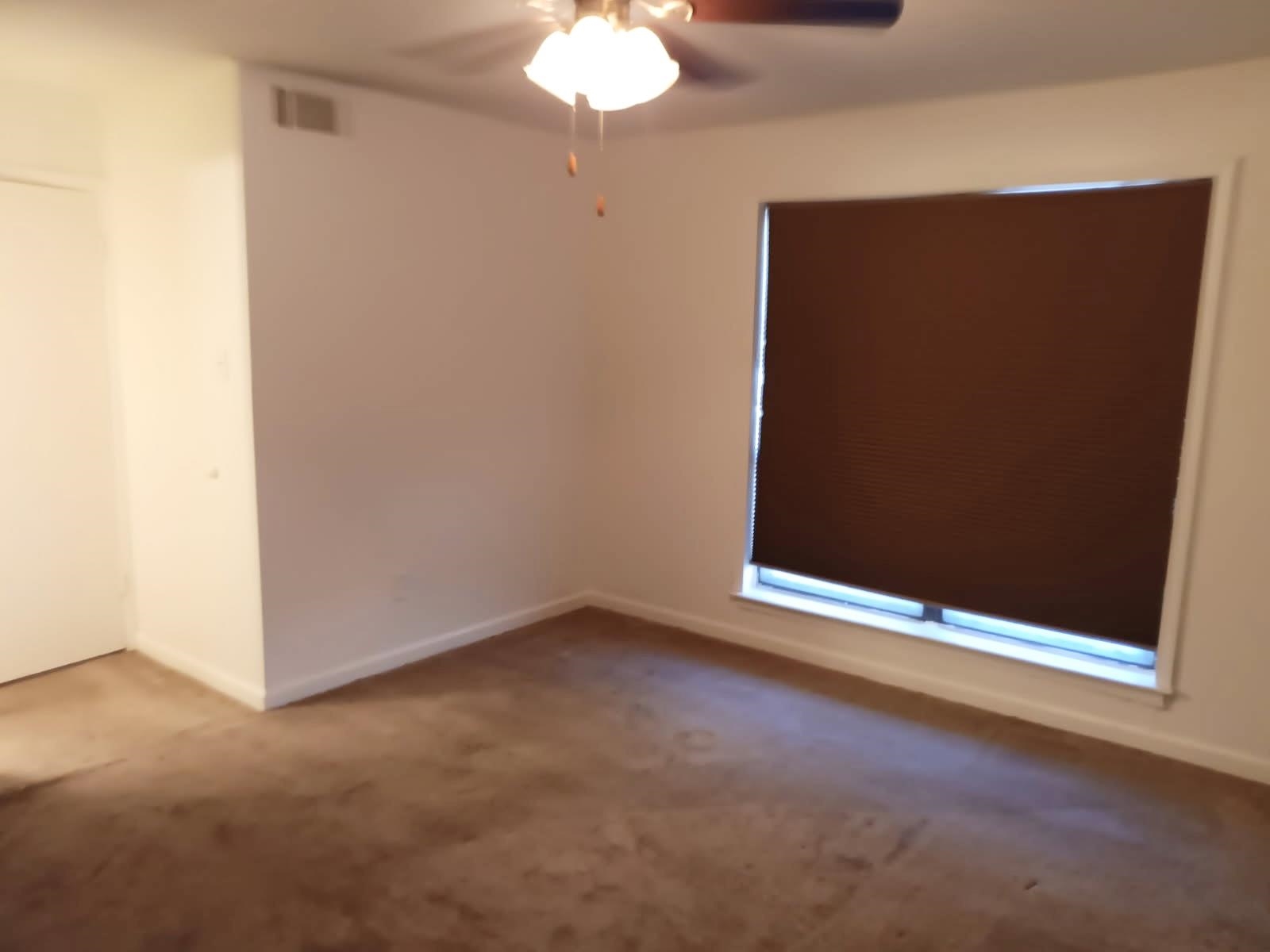 1770 Crompton 6th Square, Unit 29 Memphis, TN 38134 - Photo 13 of 21 Carpeted spare room featuring baseboards and ceiling fan