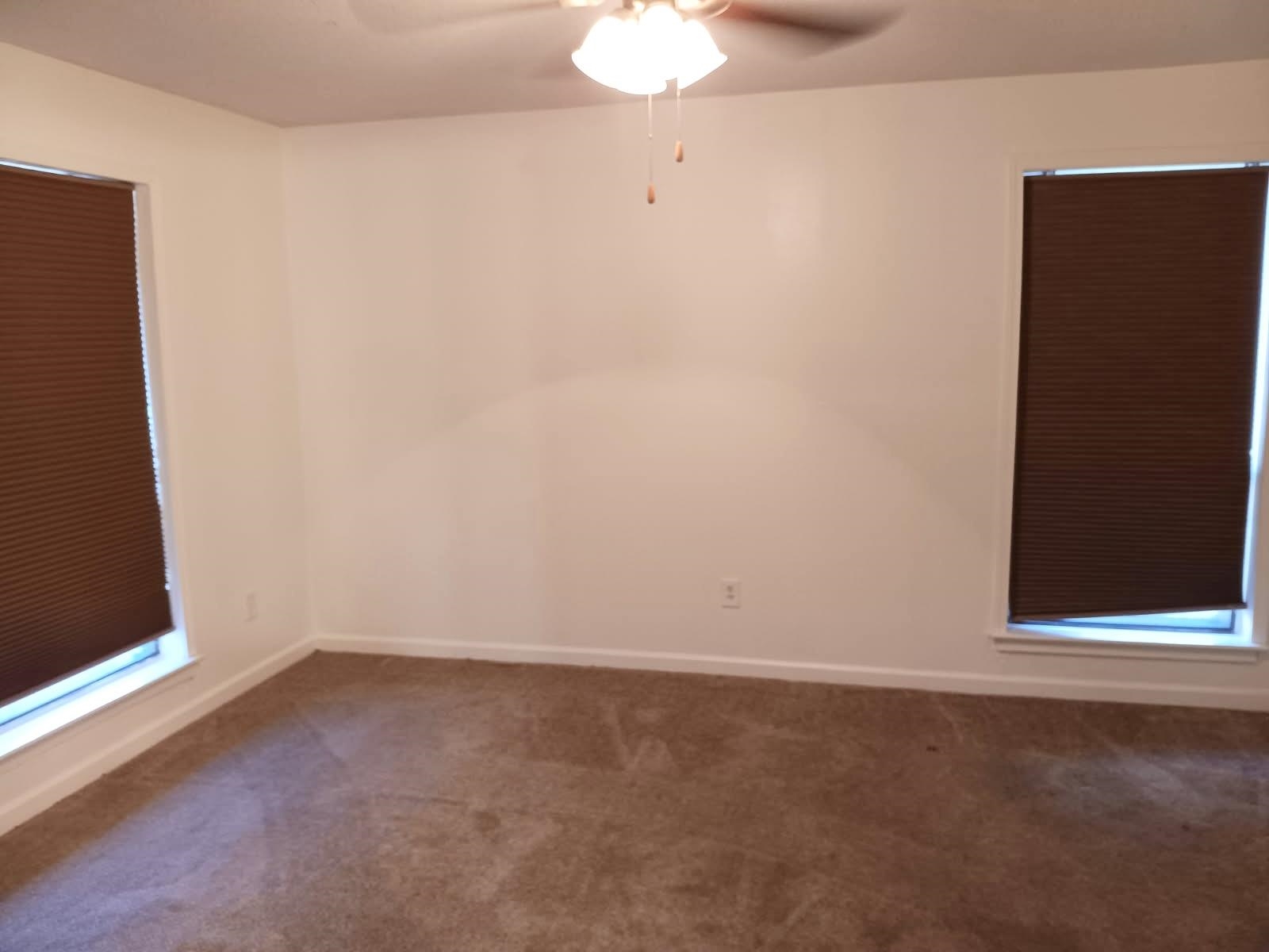 1770 Crompton 6th Square, Unit 29 Memphis, TN 38134 - Photo 14 of 21 Spare room featuring dark colored carpet and ceiling fan