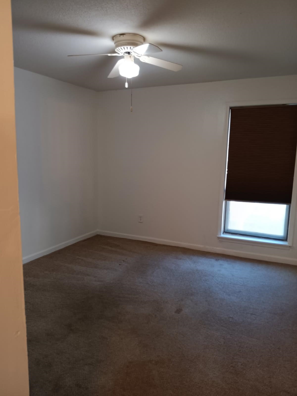1770 Crompton 6th Square, Unit 29 Memphis, TN 38134 - Photo 16 of 21 Bedroom featuring dark carpet and ceiling fan