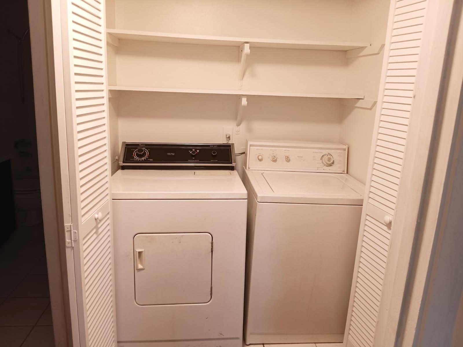 1770 Crompton 6th Square, Unit 29 Memphis, TN 38134 - Photo 17 of 21 Laundry area featuring washing machine and clothes dryer